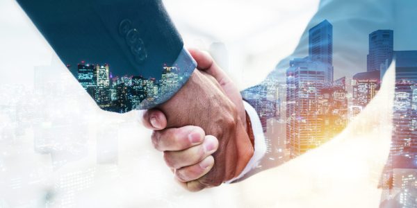 Welcome. double exposure of business man partner handshake with during sunrise and cityscape background, digital communication technology, investment, negotiation, partnership and teamwork concept